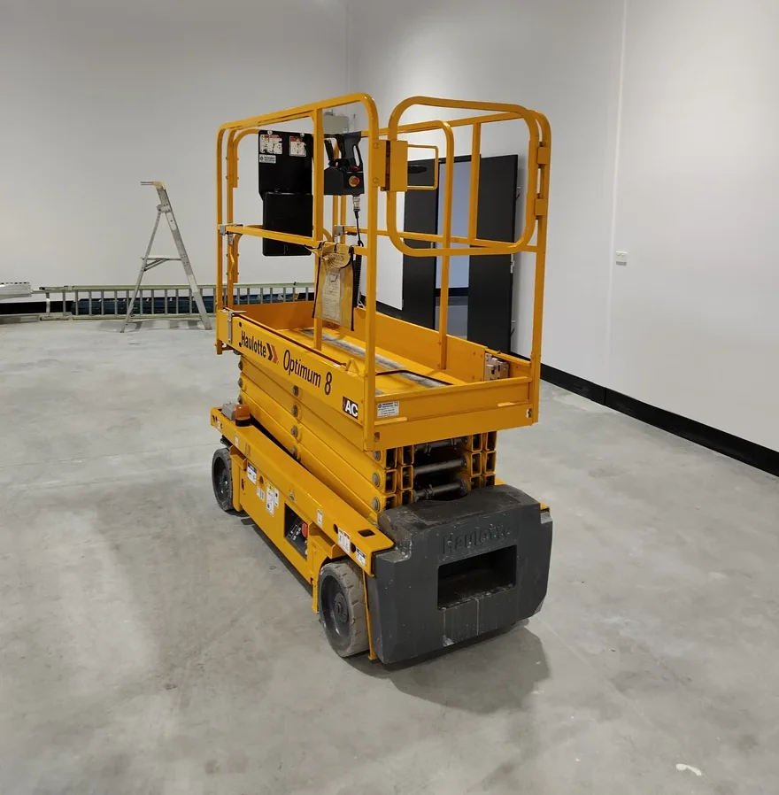 Refurbished electric scissor lift working on site after handover